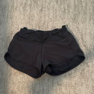 Size 4 black lululemon shorts. Perfect condition.